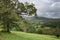 Landscape image of view from Precipice Walk in Snowdonia overlooking Barmouth and Coed-y-Brenin forest during rainy afternoon in