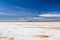 Landscape of incredibly white salt flat Salar de Uyuni, amid the Andes in southwest Bolivia, South America