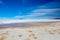 Landscape of incredibly white salt flat Salar de Uyuni, amid the Andes in southwest Bolivia, South America