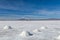 Landscape of incredibly white salt flat Salar de Uyuni, amid the Andes in southwest Bolivia, South America