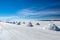 Landscape of incredibly white salt flat Salar de Uyuni, amid the Andes in southwest Bolivia, South America