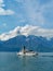 Landscape of lake geneva and swiss alps with CGN boat la Suisse in middle ground