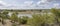 landscape with lake in lush shrubland vegetation at Kruger park, South Africa