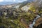 Landscape in Landmannalaugar along Brennisteinsoldukvisl river flow in Iceland Highlands at summer Midnight