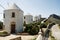 Landscape of Leros island with old traditional windmills and old Venetian fortress in the background