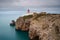 Landscape of the lighthouse and cliffs at Cape St. Vincent at sunset. Algarve amazing seascape.  Continental Europe`s most South-