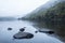 Landscape of Llyn Crafnant during foggy Autumn morning in Snowdo