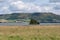 Landscape of Loch Leven, small island and mountain range in background near Kinross, Scotland