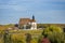 Landscape in Lower Franconia, colorful vineyards with colorful leaves in autumn colors, pilgrimage church Maria in the vineyard,