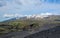 Landscape of Maelifellsandur volcanic black sand desert with Tindafjallajokull glacier and blue sky, summer in Highlands of