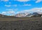 Landscape of Maelifellsandur volcanic black sand desert with Tindafjallajokull glacier and blue sky, summer in Highlands of