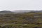 Landscape with many lava craters at grotto Grotagja Cave in Myvatn, Iceland