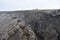 Landscape with many lava craters at grotto Grotagja Cave in Myvatn, Iceland