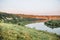 Landscape meandering channel rocks canyons green vegetation