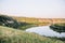 Landscape meandering channel rocks canyons green vegetation