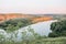 Landscape meandering channel rocks canyons green vegetation