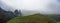 Landscape of the medieval Lithuanian capital Kernave from above with mounds sunken in fog.