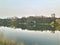 The landscape of the metropolis. High-rise buildings. Reflection in water.