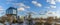 Landscape with modern National library building in Belarus on classic blue sky with clouds background. Space for text.