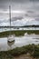 Landscape of moody evening sky over low tide marine