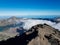 Landscape of Mount Rinjani with steep cliffs and exotic Segara Anak lake