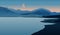 Landscape with mountain peaks and the moon and lake. The concept of serene relaxation and meditation. Vector illustration