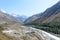 Landscape of mountain valley, panorama of city Sangla Valley, Chitkul village, from the hiking trail in Himalayas Mountains, in