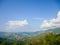 Landscape mountain view name thai : Doi Sakad at PUA,NAN,Thailand.Landmark green environment outdoor on blue sky.Beautiful forest