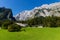 Landscape of mountains, green field, sky, forest in Konigsee, Germany