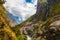 Landscape Mountains Hiking Himalayas.Beautiful View Waterfalls End Summer Season Background.Green Threes Cloudy Blue Sky