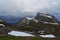 Landscape of mountains with snow on Trollstigen road Norway