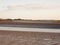 Landscape of mud flats in essex with river tide out no people wa