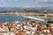 Landscape of Nafplio city with harbour, cranes and industrial buildings in Nafplio, Greece