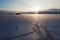 Landscape with natural drawing on snowed icefield and solar halo