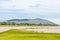 Landscape nature large reservoir with sky and clouds,mountain background