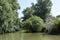 Landscape on a navigable canal surrounded by vegetation in the Danube Delta, Romania