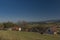 Landscape near Zlata Koruna village with green meadows in spring day