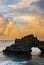 Landscape, Ocean in sunset with cliff and natural arch at Tanah lot, Bali