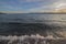 Landscape. Ohrid Lake at sunset. With waves breaking down on the shore.