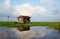 Landscape , old hut on the lake at countryside cloud and blue sky background