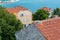 Landscape of Old town Budva: Ancient walls and red tiled roof. Montenegro, Europe.