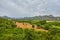 landscape with oranges and pomegranate garden and mountains