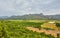 landscape with oranges and pomegranate garden and mountains