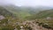 Landscape overgrown with Dolomites of northern Italy. In heavy fog