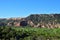 Landscape of Palo Duro Canyon State Park with lush green vegetation and rock formations in Texas