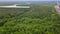 Landscape panorama, blue water in a forest lake with trees soft focus