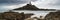 Landscape panorama of Mumbles lighthouse in Wales with sunbeams