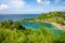 Landscape of the Parlatuvier bay surrounded by the sea under the sunlight in Trinidad and Tobago