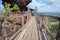 Landscape, pathway, high and steep wooden floor, beautiful sky background on the rocky mountain, Phu Thok Temple, Bueng Kan