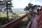 Landscape, pathway, high and steep wooden floor, beautiful sky background on the rocky mountain, Phu Thok Temple, Bueng Kan